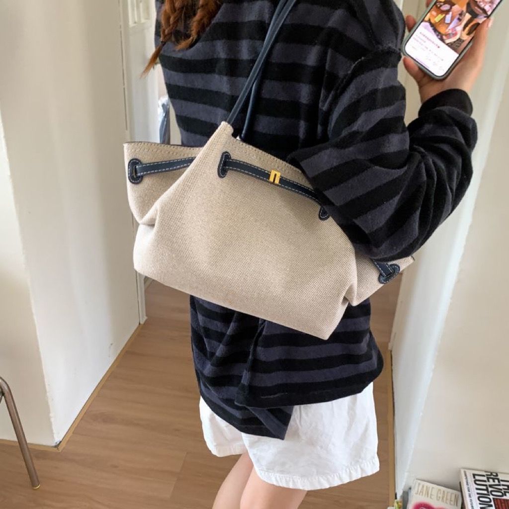Canvas handbag with leather handles
