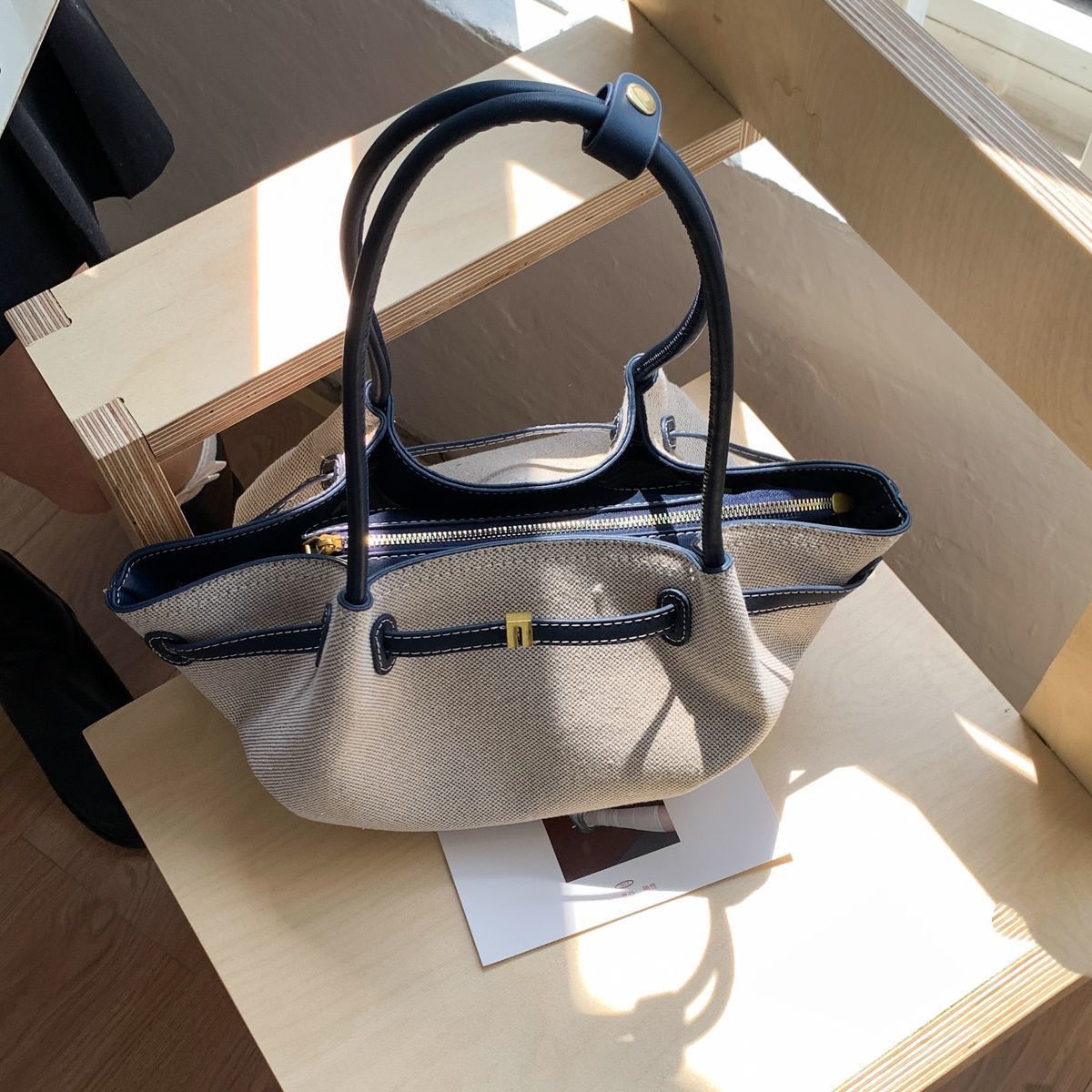Canvas handbag with leather handles